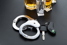 Handcuffs, car keys and alcohol - DUI Defense in Boise